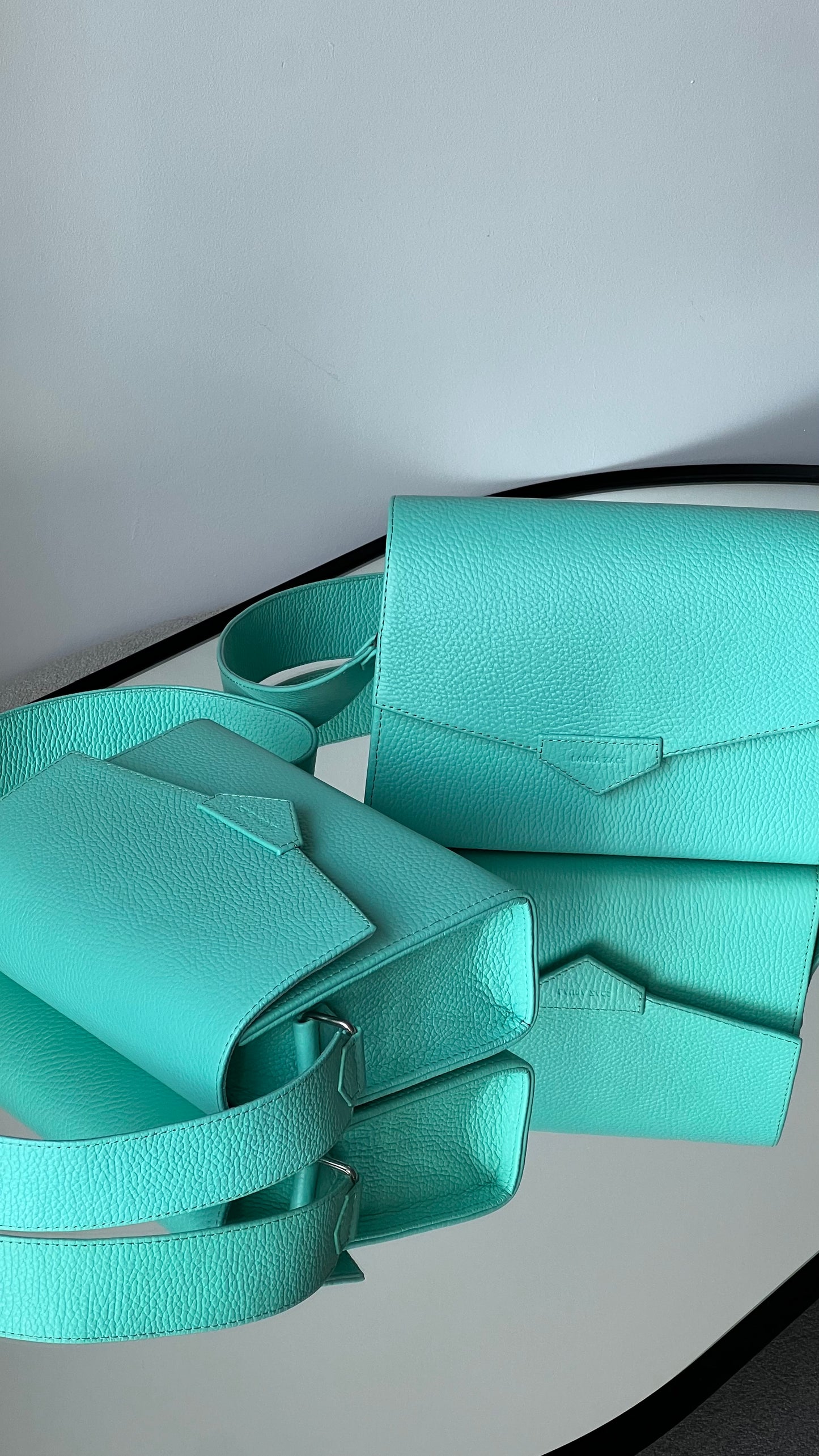 CROSS BODY BAG IN TURQUOISE LEATHER