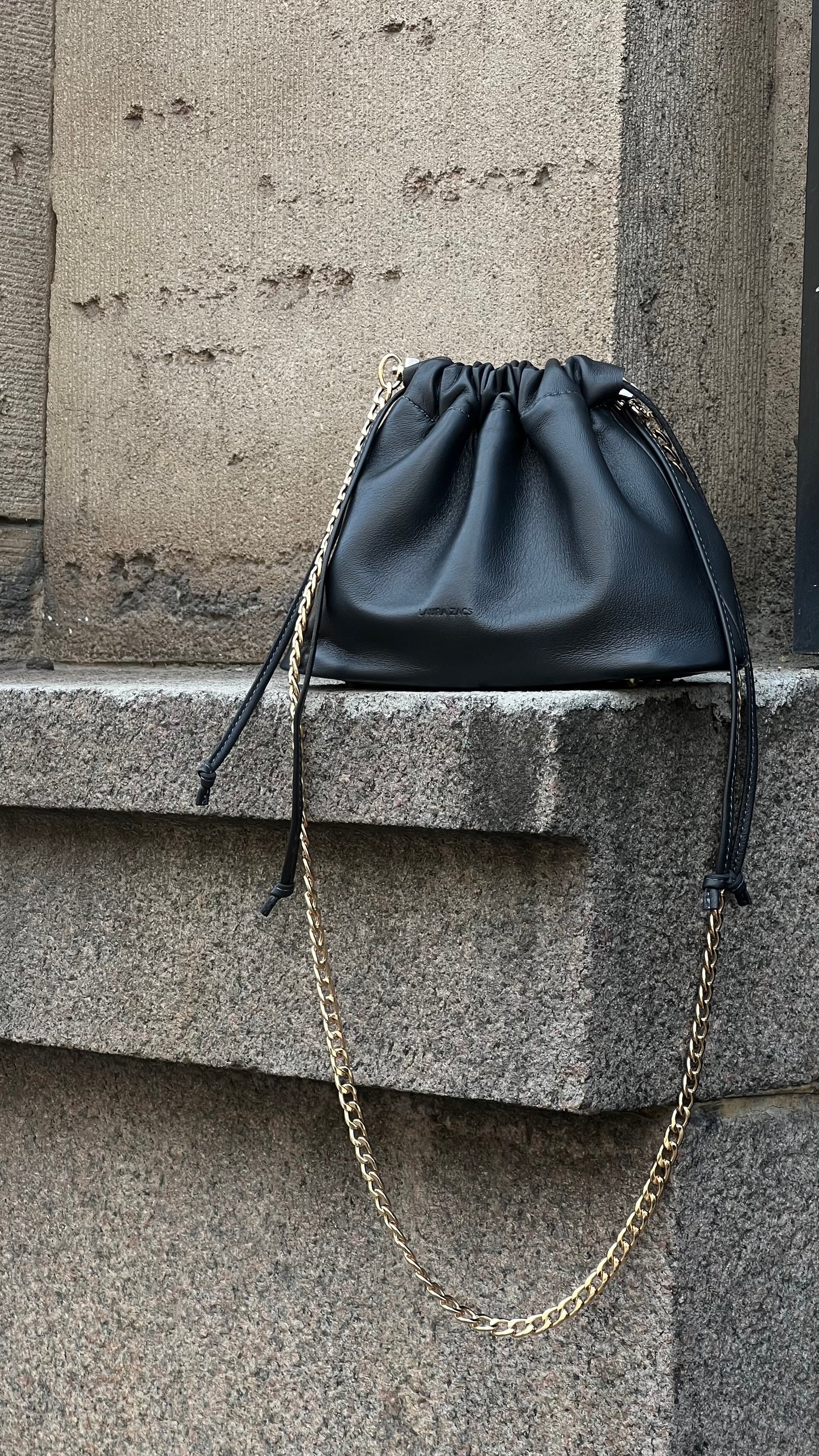 NOCTURNE MINI – CHARCOAL GREY LAMBSKIN HANDBAG WITH GOLD CHAIN