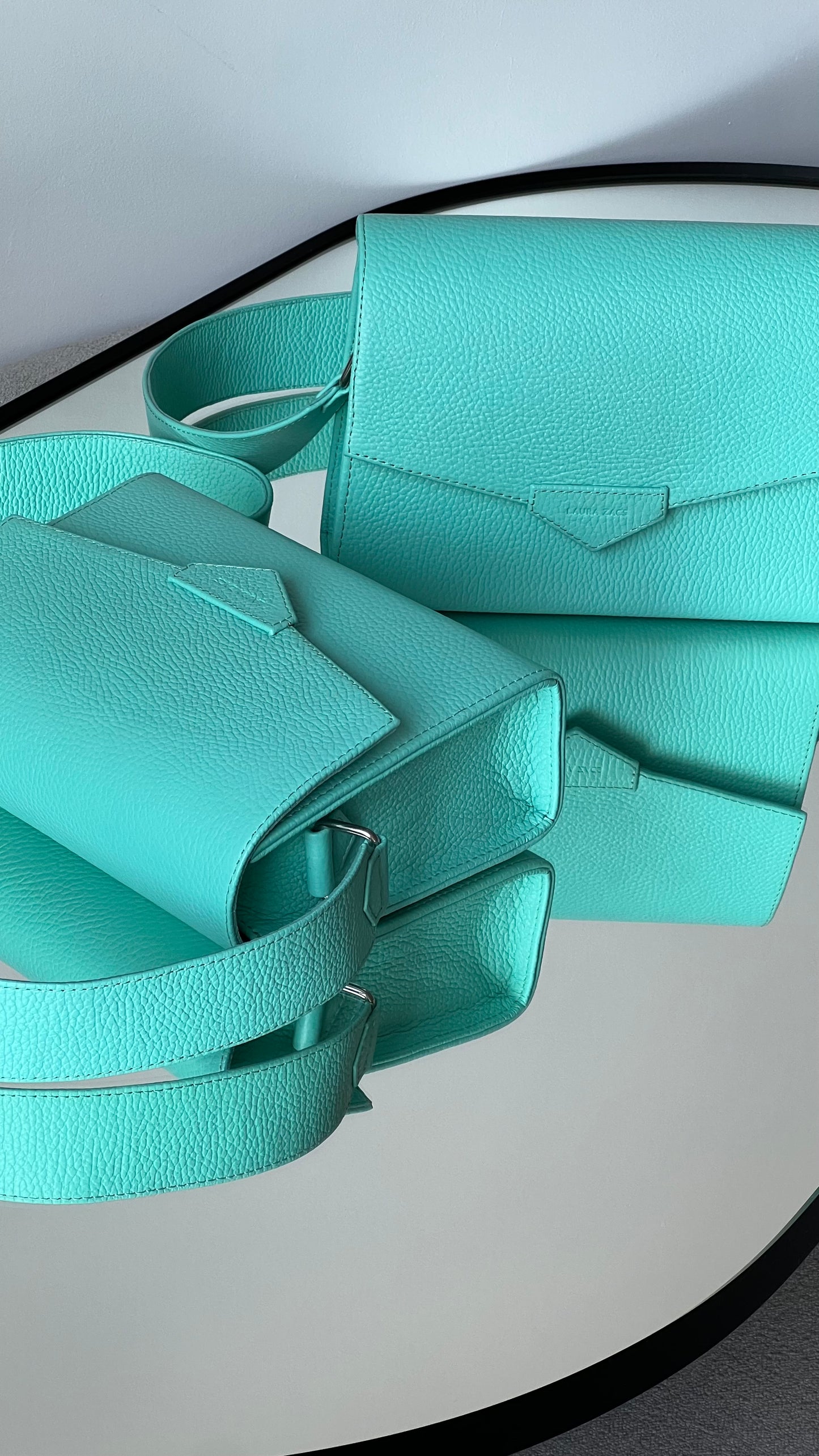 CROSS BODY BAG IN TURQUOISE LEATHER